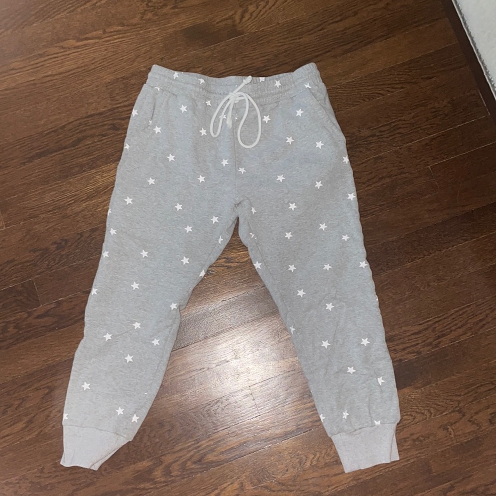 Gray and white star printed joggers size M